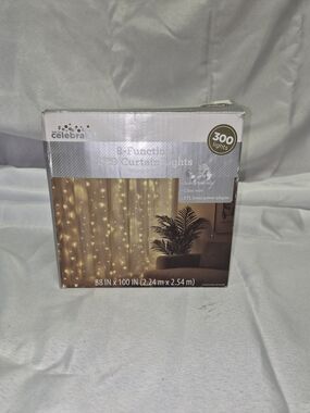300-Light Warm White LED Curtain Lights - Clear Wire